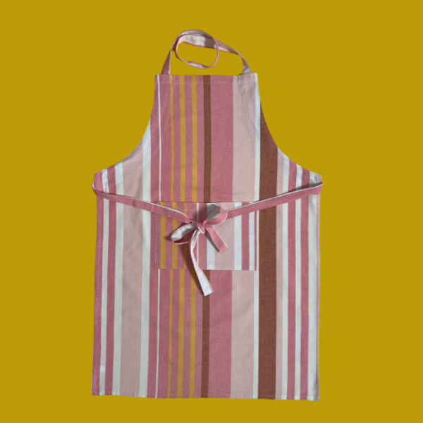 100% cotton kitchen and BBQ aprons by Carnival Homewares in bold striped designs. Adjustable fit with front pocket. Ethically made in India. Perfect for cooking, baking, or BBQs. Great gift idea for housewarmings, birthdays, or special occasions.