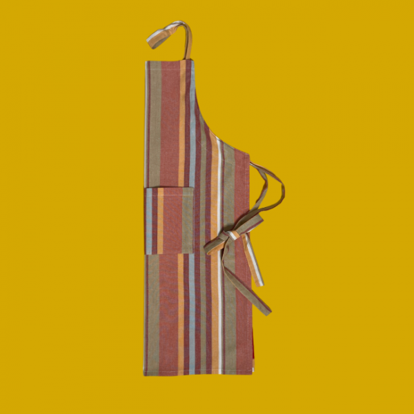 100% cotton kitchen and BBQ aprons by Carnival Homewares in bold striped designs. Adjustable fit with front pocket. Ethically made in India. Perfect for cooking, baking, or BBQs. Great gift idea for housewarmings, birthdays, or special occasions.