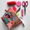 Sept'25 Essentials Travel Pouch - coral